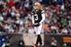Nov 4, 2012; Cleveland, OH, USA; Cleveland Browns quarterback Brandon Weeden (3) walks back to the huddle in the third quarter against the Baltimore Ravens at Cleveland Browns Stadium. Mandatory Credit: Andrew Weber-US PRESSWIRE