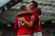 MANCHESTER, ENGLAND - OCTOBER 20: Wayne Rooney of Manchester United celebrates scoring to make it 1-1 with Robin van Persie during the Barclays Premier League match between Manchester United and Stoke City at Old Trafford on October 20, 2012 in Manchester, England. (Photo by Michael Regan/Getty Images)