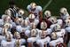BOULDER, CO - NOVEMBER 03: Head coach David Shaw of the Stanford Cardinals leads his team with quarterback Kevin Hogan #8 of the Stanford Cardinals against the Colorado Buffaloes at Folsom Field on November 3, 2012 in Boulder, Colorado. The Cardinal defeated the Buffaloes 48-0. (Photo by Doug Pensinger/Getty Images)