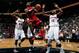 ATLANTA, GA - OCTOBER 07: LeBron James #6 of the Miami Heat drives against Ivan Johnson #44 and Johan Petro #10 of the Atlanta Hawks at Philips Arena on October 7, 2012 in Atlanta, Georgia. NOTE TO USER: User expressly acknowledges and agrees that, by downloading and or using this photograph, User is consenting to the terms and conditions of the Getty Images License Agreement. (Photo by Kevin C. Cox/Getty Images)