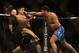 Jul. 7, 2012; Las Vegas, NV, USA; UFC fighter Patrick Coto (right) punches Cung Le during a middleweight bout in UFC 148 at the MGM Grand Garden Arena. Mandatory Credit: Mark J. Rebilas-US PRESSWIRE