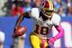 EAST RUTHERFORD, NJ - OCTOBER 21: Quarterback Robert Griffin III #10 of the Washington Redskins runs against the New York Giants during their game at MetLife Stadium on October 21, 2012 in East Rutherford, New Jersey. (Photo by Alex Trautwig/Getty Images)