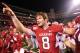 Nov 5, 2011; Fayetteville, AR, USA; Arkansas Razorbacks quarterback Tyler Wilson (8) celebrates after the game against the South Carolina Gamecocks at Donald W. Reynolds Razorback Stadium. Arkansas defeated South Carolina 44-28. Mandatory Credit: Nelson Chenault-US PRESSWIRE