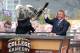 Sep 1, 2012; Arlington, TX, USA; ESPN analyst Lee Corso (left) wears the Alabama mascot head as analyst Kirk Herbstreit (right) laughs on the set of ESPN College Gameday before the game between the Alabama Crimson Tide and the Michigan Wolverines at Cowboys Stadium. Mandatory Credit: Kevin Jairaj-US PRESSWIRE