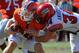 GAINESVILLE, FL - NOVEMBER 10: Quarterback Jeff Driskel #6 of the Florida Gators is tackled by linebacker Justin Anderson #34 of the Louisiana-Lafayette Ragin' Cajuns November 10, 2012 in Gainesville, Florida. (Photo by Al Messerschmidt/Getty Images)