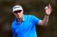 LAKE BUENA VISTA, FL - NOVEMBER 10: Charlie Beljan acknowledges the crowd on the 15th hole during the third round of the Children's Miracle Network Hospitals Classic at the Disney Magnolia course on November 10, 2012 in Lake Buena Vista, Florida. (Photo by Sam Greenwood/Getty Images)
