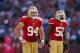 SAN FRANCISCO, CA - OCTOBER 14: Defensive tackle Justin Smith #94 and linebacker Patrick Willis #52 of the San Francisco 49ers wait for a play against the New York Giants in the third quarter on October 14, 2012 at Candlestick Park in San Francisco, California. The Giants won 26-3. (Photo by Brian Bahr/Getty Images)