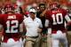 DALLAS, TX - OCTOBER 13: Head coach Bob Stoops (2nd from L) of the Oklahoma Sooners celebrates with Landry Jones #12 of the Oklahoma Sooners and Blake Bell #10 of the Oklahoma Sooners after Bell scored against the Texas Longhorns at Cotton Bowl on October 13, 2012 in Dallas, Texas. The Oklahoma Sooners beat the Texas Longhorns 63-21. (Photo by Tom Pennington/Getty Images)