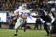 Nov 10, 2012; Fort Worth, TX, USA; Kansas State Wildcats quarterback Collin Klein (7) is sacked by Texas Christian Horned Frogs defensive tackle Chucky Hunter (96) in the second quarter at Amon G Carter Stadium. Mandatory Credit: Jim Cowsert-US PRESSWIRE