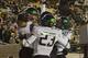 BERKELEY, CA - NOVEMBER 10: Colt Lyeria #15, Josh Huff #1 and B.J. Kelly #23 of the Oregon Ducks celebrates after Lyeria scored on a fourteen yard touchdown play against the California Golden Bears in the fourth quarter of an NCAA College football game at California Memorial Stadium on November 10, 2012 in Berkeley, California. (Photo by Thearon W. Henderson/Getty Images)