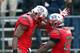 PISCATAWAY, NJ - NOVEMBER 10: Brandon Coleman #17 of the Rutgers Scarlet Knights celebrates with teammate Jawan Jamison #23 after Coleman scored the game winning touchdown against the Army Black Knights on November 10, 2012 at High Point Solutions Stadium in Piscataway, New Jersey.The Rutgers Scarlet Knights defeated the Army Black Knights 28-7. (Photo by Elsa/Getty Images)