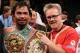 LAS VEGAS - NOVEMBER 14: Manny Pacquiao celebrates his 12 round TKO victory against Miguel Cotto with trainer Freddy Roach during their WBO welterweight title fight at the MGM Grand Garden Arena on November 14, 2009 in Las Vegas, Nevada. (Photo by Al Bello/Getty Images)
