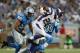 DETROIT, MI - SEPTEMBER 30: Adrian Peterson #28 of the Minnesota Vikings runs for a fshort gain as DeAndre Levy #54 and Erik Coleman #24 of the Detroit Lions attempt to make the stop during the game at Ford Field on September 30, 2012 in Detroit, Michigan. The Vikings defeated the Lions 20-13. (Photo by Leon Halip/Getty Images)