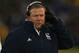 SOUTH BEND, IN - NOVEMBER 03: Head coach Brian Kelly of the Notre Dame Fighting Irish talks to coaches on the headphones during a game against the Pittsburgh Panthers at Notre Dame Stadium on November 3, 2012 in South Bend, Indiana. Notre Dame defeated Pittsburgh 29-26 in triple overtime. (Photo by Jonathan Daniel/Getty Images)