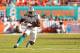 MIAMI GARDENS, FL - NOVEMBER 11: Daniel Thomas #33 of the Miami Dolphins rushes during a game against the Tennessee Titans at Sun Life Stadium on November 11, 2012 in Miami Gardens, Florida. (Photo by Mike Ehrmann/Getty Images)