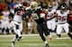 NEW ORLEANS, LA - NOVEMBER 11: Chris Ivory #29 of the New Orleans Saints runs past Dunta Robinson #23 of the Atlanta Falcons to score a touchdown at The Mercedes-Benz Superdome on November 11, 2012 in New Orleans, Louisiana. (Photo by Chris Graythen/Getty Images)