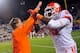 DURHAM, NC - NOVEMBER 03: Coach Dabo Swinney and Isaiah Battle #79 of the Clemson Tigers celebrate after touchdown against the Duke Blue Devils during play at Wallace Wade Stadium on November 3, 2012 in Durham, North Carolina. Clemson won 56-20. (Photo by Grant Halverson/Getty Images)