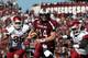 COLUMBIA, SC - NOVEMBER 10: Otha Peters #5 of the Arkansas Razorbacks chases Connor Shaw #14 of the South Carolina Gamecocks during their game at Williams-Brice Stadium on November 10, 2012 in Columbia, South Carolina. (Photo by Streeter Lecka/Getty Images)