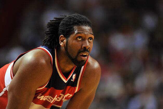 Injured Nene faces more time on Wizards' sideline