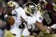 Nov 10, 2012; Boston, MA, USA; Notre Dame Fighting Irish quarterback Everett Golson (5) runs the ball against the Boston College Eagles during the first half at Alumni Stadium. Mandatory Credit: Mark L. Baer-US PRESSWIRE