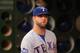 OAKLAND, CA - OCTOBER 02: Mike Napoli #25 of the Texas Rangers stands in the dugout before their game against the Oakland Athletics at O.co Coliseum on October 2, 2012 in Oakland, California. (Photo by Ezra Shaw/Getty Images)
