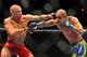 LAS VEGAS - JULY 11: (L-R) Georges St. Pierre battles Thiago Alves during their welterweight title bout during UFC 100 on July 11, 2009 in Las Vegas, Nevada. (Photo by Jon Kopaloff/Getty Images)