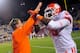 DURHAM, NC - NOVEMBER 03: Coach Dabo Swinney and Isaiah Battle #79 of the Clemson Tigers celebrate after touchdown against the Duke Blue Devils during play at Wallace Wade Stadium on November 3, 2012 in Durham, North Carolina. Clemson won 56-20. (Photo by Grant Halverson/Getty Images)