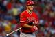 BOSTON, MA - AUGUST 23: Mike Trout #27 of the Los Angeles Angels stands in the on-deck circle against the Boston Red Sox during the game on August 23, 2012 at Fenway Park in Boston, Massachusetts. (Photo by Jared Wickerham/Getty Images)