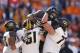 KNOXVILLE, TN - NOVEMBER 10: Kendial Lawrence #4 of the Missouri Tigers celebrates with teammates after rushing for a touchdown in the third quarter against the Tennessee Volunteers during the game at Neyland Stadium on November 10, 2012 in Knoxville, Tennessee. Missouri won 51-48 in four overtimes. (Photo by Joe Robbins/Getty Images)