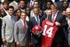 WASHINGTON, DC - APRIL 19: U.S. President Barack Obama (3rd L) poses for a group picture with members of the University of Alabama Crimson Tide, including coach Nick Saban (2nd L), quarterback A.J. McCarron (L), and offensive lineman Barrett Jones (4th L)during a South Lawn event at the White House April 19, 2012 in Washington, DC. Obama hosted the BCS national champion to honor their win over the Louisiana State University Tigers. (Photo by Alex Wong/Getty Images)