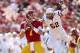 LOS ANGELES, CA - NOVEMBER 10: Quarterback Matt Barkley #7 of the USC Trojans seets to pass as lonebacker Carl Bradford #52 of the Arizona State Sun Devils rushes at the Los Angeles Memorial Coliseum on November 10, 2012 in Los Angeles, California. USC won 38-17. (Photo by Stephen Dunn/Getty Images)