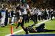 BERKELEY, CA - NOVEMBER 10: Colt Lyeria #15 of the Oregon Ducks runs out of the tackle of Alex Logan #6 of the California Golden Bears and into the endzone for a fourteen-yard touchdown play in the fourth quarter of an NCAA College football game at California Memorial Stadium on November 10, 2012 in Berkeley, California. (Photo by Thearon W. Henderson/Getty Images)