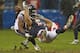 CHICAGO, IL - NOVEMBER 11: Kellen Davis #87 of the Chicago Bears can't make a catch as he is hit by Danieal Manning #38 of the Houston Texans at Soldier Field on November 11, 2012 in Chicago, Illinois. The Texans defeated the Bears 13-6. (Photo by Jonathan Daniel/Getty Images)