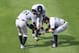 Aug 26, 2012; Cleveland, OH, USA; New York Yankees outfielder Ichiro Suzuki (31), center fielder Curtis Granderson (center) and outfielder Nick Swisher (33) celebrate a 4-2 win over the Cleveland Indians at Progressive Field. Mandatory Credit: David Richard-US PRESSWIRE