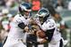 Aug 30, 2012; Philadelphia, PA, USA; Philadelphia Eagles quarterback Nick Foles (9) hands the ball off to running back Chris Polk (32) during the first quarter against the New York Jets at Lincoln Financial Field. Mandatory Credit: Howard Smith-US PRESSWIRE
