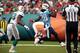MIAMI GARDENS, FL - NOVEMBER 11: Running back Chris Johnson #28 of the Tennessee Titans scores a touchdown against the Miami Dolphins at Sun Life Stadium on November 11, 2012 in Miami Gardens, Florida. The Titans defeated the Dolphins 37-3. (Photo by Marc Serota/Getty Images)