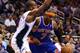 Nov 13, 2012; Orlando, FL, USA; New York Knicks small forward Carmelo Anthony (7) drives around Orlando Magic shooting guard Arron Afflalo (4) during the first quarter at Amway Center. Mandatory Credit: Douglas Jones-US PRESSWIRE