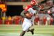 LINCOLN, NE - SEPTEMBER 29: Running back Montee Ball #28 of the Wisconsin Badgers stiff arms safety P.J. Smith #13 of the Nebraska Cornhuskers during their game at Memorial Stadium on September 29, 2012 in Lincoln, Nebraska. (Photo by Eric Francis/Getty Images)