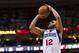 Nov 12, 2012; Philadelphia, PA, USA; Philadelphia 76ers guard Evan Turner (12) shoots a jump shot during the first quarter against the Milwaukee Bucks at the Wachovia Center. Mandatory Credit: Howard Smith-US PRESSWIRE