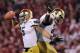 Oct. 27, 2012; Norman, OK, USA; Notre Dame Fighting Irish linebacker Manti Te'o (5) celebrates with defensive end Kapron Lewis-Moore (89) after a fourth quarter interception against the Oklahoma Sooners at Oklahoma Memorial Stadium. Notre Dame won 30-13. Mandatory Credit: Matt Cashore-US PRESSWIRE