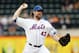 NEW YORK, NY - SEPTEMBER 22: R.A. Dickey #43 of the New York Mets pitches against the Miami Marlins at Citi Field on September 22, 2012 in the Flushing neighborhood of the Queens borough of New York City. (Photo by Alex Trautwig/Getty Images)