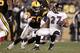 PITTSBURGH, PA - NOVEMBER 06: Ray Rice #27 of the Baltimore Ravens runs with the ball while evading a tackle by Larry Foote #50 of the Pittsburgh Steelers during the game on November 6, 2011 at Heinz Field in Pittsburgh, Pennsylvania. (Photo by Jared Wickerham/Getty Images)