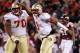 BLACKSBURG, VA - NOVEMBER 08: Quarterback EJ Manuel #3 of the Florida State Seminoles celebrates with offensive lineman Josue Matias #70 of the Seminoles after throwing the game-winning touchdown in the final minute against the Virginia Tech Hokies at Lane Stadium on November 8, 2012 in Blacksburg, Virginia. The Seminoles won 28-22. (Photo by Geoff Burke/Getty Images)