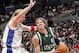LOS ANGELES - APRIL 10: Dirk Nowitzki #41 of the Dallas Mavericks drives against Chris Kaman #35 of the Los Angeles Clippers on April 10, 2006 at Staples Center in Los Angeles, California. NOTE TO USER: User expressly acknowledges and agrees that, by downloading and or using this photograph, User is consenting to the terms and conditions of the Getty Images License Agreement. (Photo by Lisa Blumenfeld/Getty Images)