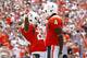 MIAMI GARDENS, FL - SEPTEMBER 29: Phillip Dorsett #4 is congratulated by Joey McNeill #24 of the Miami Hurricanes after scoring a touchdown against the North Carolina State Wolfpack on September 29, 2012 at Sun Life Stadium in Miami Gardens, Florida. (Photo by Joel Auerbach/Getty Images)