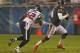 Houston Texans linebacker Tim Dobbins, No. 52, pursues Chicago Bears quarterback Jay Cutler during last Sunday night's game. Dobbins' hit on Cutler in the second quarter caused Cutler's concussion.