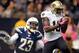 NEW ORLEANS, LA - OCTOBER 07: Marques Colston #12 of the New Orleans Saints makes a catch over the middle in front of Quentin Jammer #23 of the San Diego Chargers during the fourth quarter at Mercedes-Benz Superdome on October 7, 2012 in New Orleans, Louisiana. (Photo by Harry How/Getty Images)