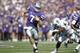 MANHATTAN, KS - OCTOBER 1: Collin Klein #7 of the Kansas State Wildcats runs with the football around the defense of Elliot Coffey #4 of the Baylor Bears at Bill Snyder Family Football Stadium on October 1, 2011 in Manhattan, Kansas. The Wildcats won 36-35. (Photo by Joe Robbins/Getty Images)