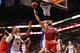 PHOENIX, AZ - NOVEMBER 14: Carlos Boozer #5 of the Chicago Bulls lays up a shot against the Phoenix Suns during the NBA game at US Airways Center on November 14, 2012 in Phoenix, Arizona. The Bulls defeated the Suns 112-106 in overtime. NOTE TO USER: User expressly acknowledges and agrees that, by downloading and or using this photograph, User is consenting to the terms and conditions of the Getty Images License Agreement. (Photo by Christian Petersen/Getty Images)