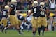 SOUTH BEND, IN - OCTOBER 20: Manti T'eo #5 of the Notre Dame Fighting Irish celebrates with Dan Fox #48 (L) and Matthias Farley #41 after intercepting a pass against of the BYU Cougars at Notre Dame Stadium on October 20, 2012 in South Bend, Indiana. Niotre Dame defeated BYU 17-14. (Photo by Jonathan Daniel/Getty Images)
